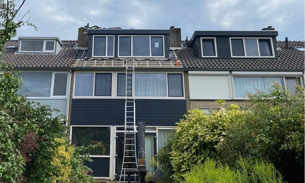 Wat kost een plat dak herstellen in Gravendeel?